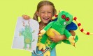 girl holding artwork turned into stuffed animal