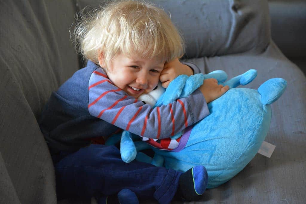 kid hugging custom Budsie