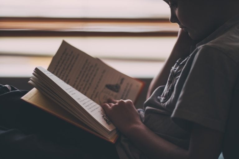 Child Reading Book